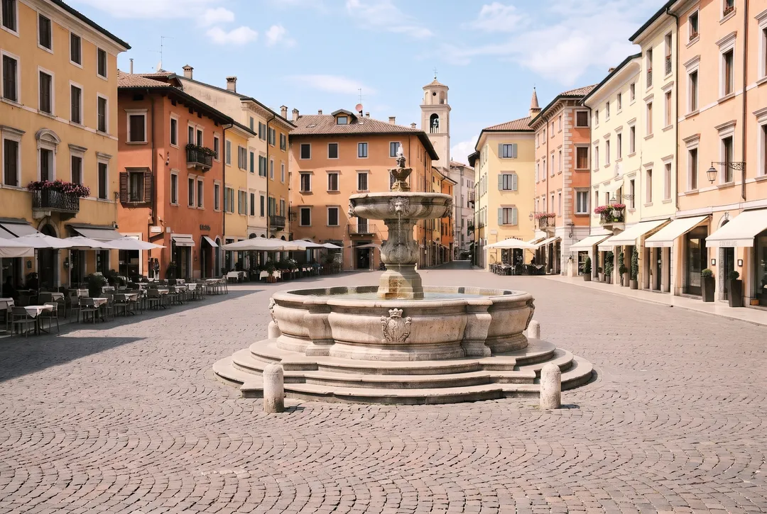 After: AI edit for “Remove all the tourists. Keep the fountain, buildings and lighting unchanged.”